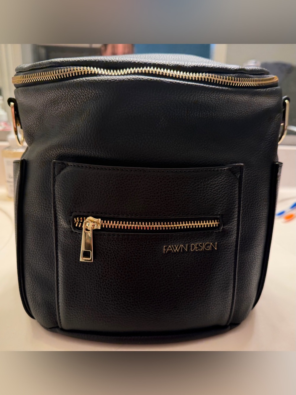 FAWN DESIGN Black Pebbled Leather Crossbody Backpack with Gold Hardware